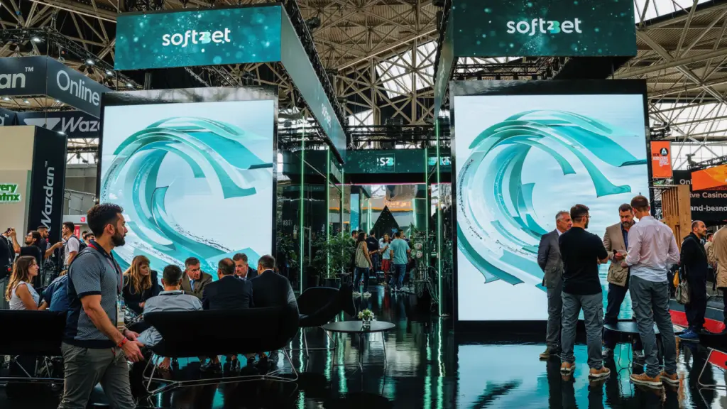 Soft2Bet logo displayed on an office wall, representing the company's operating standard